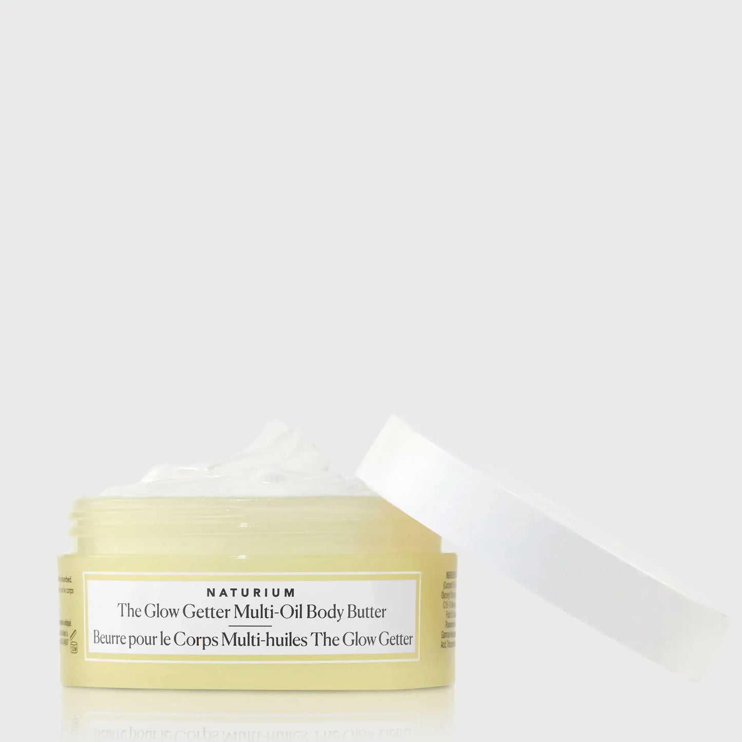 the-glow-getter-multi-oil-body-butter-travel-size-x7 NATR-40115_Glow-Getter-Body-Butter-Mini_front_capoff_bonebkgd.webp
