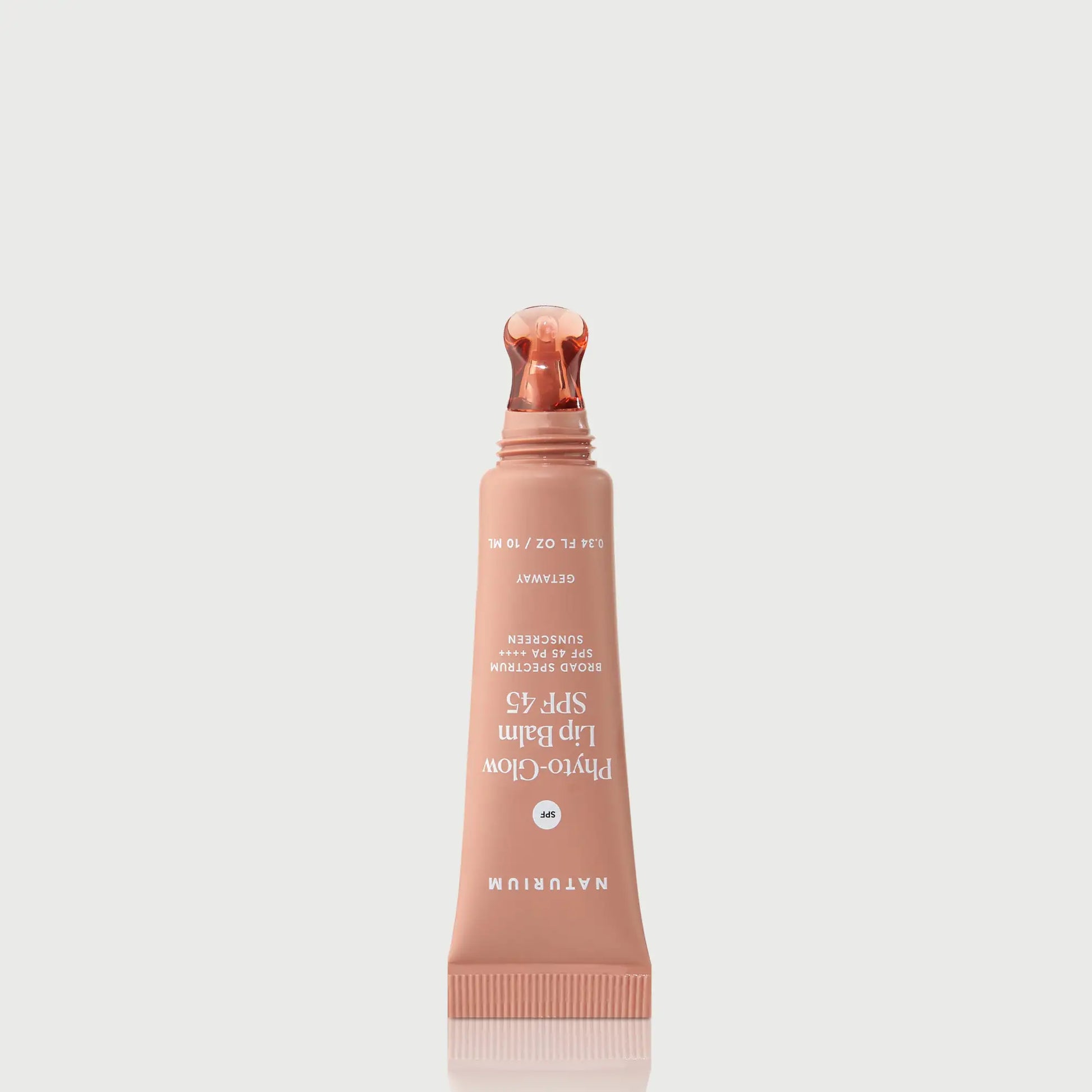 phyto-glow-lip-balm-spf-45-getaway-r9 NATR-10126_PhytoGlow_SPF_Getaway_primary_nocap_bonebkgd_1.webp