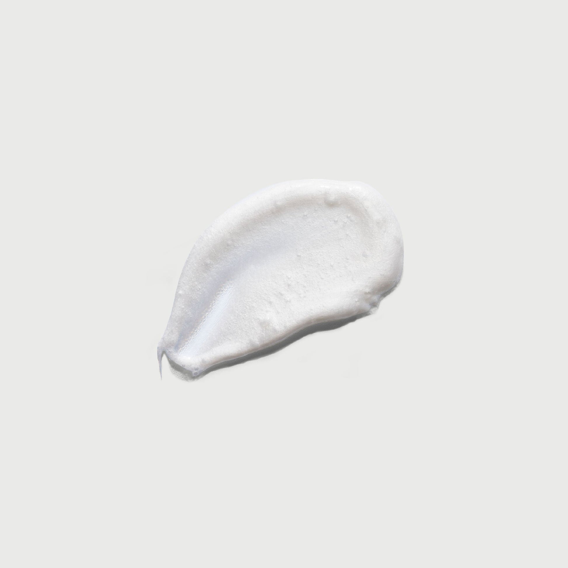 the-smoother-glycolic-acid-exfoliating-body-wash-k2 NATR-40002-Swatch-The-Smoother-Glycolic-Acid-Exfoliating-Body-Wash-bonebkgd.jpg