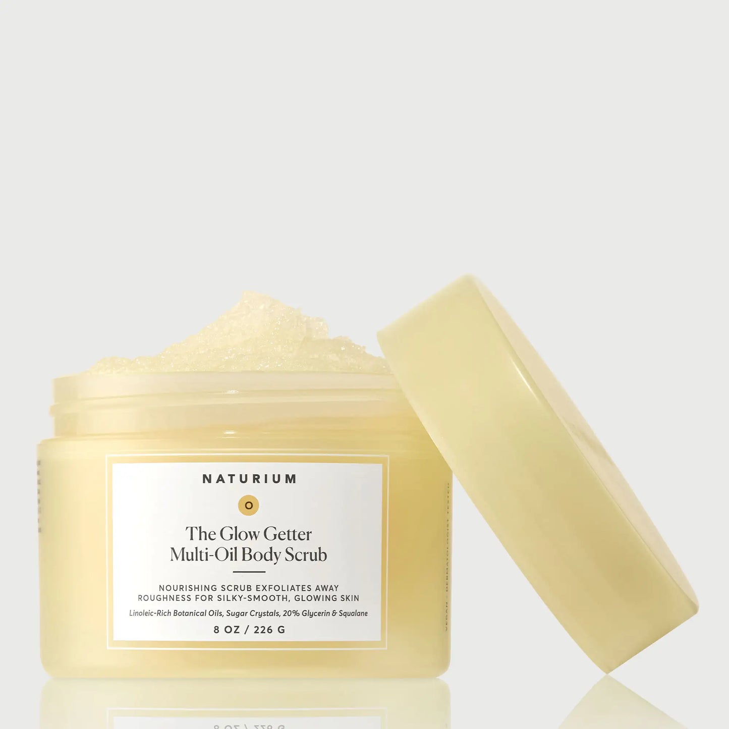 the-glow-getter-multi-oil-body-scrub-b8 NATR-40028-GlowGetter-Multi-Oil-Body-Scrub-Front-CapOff-bonebkgd.webp